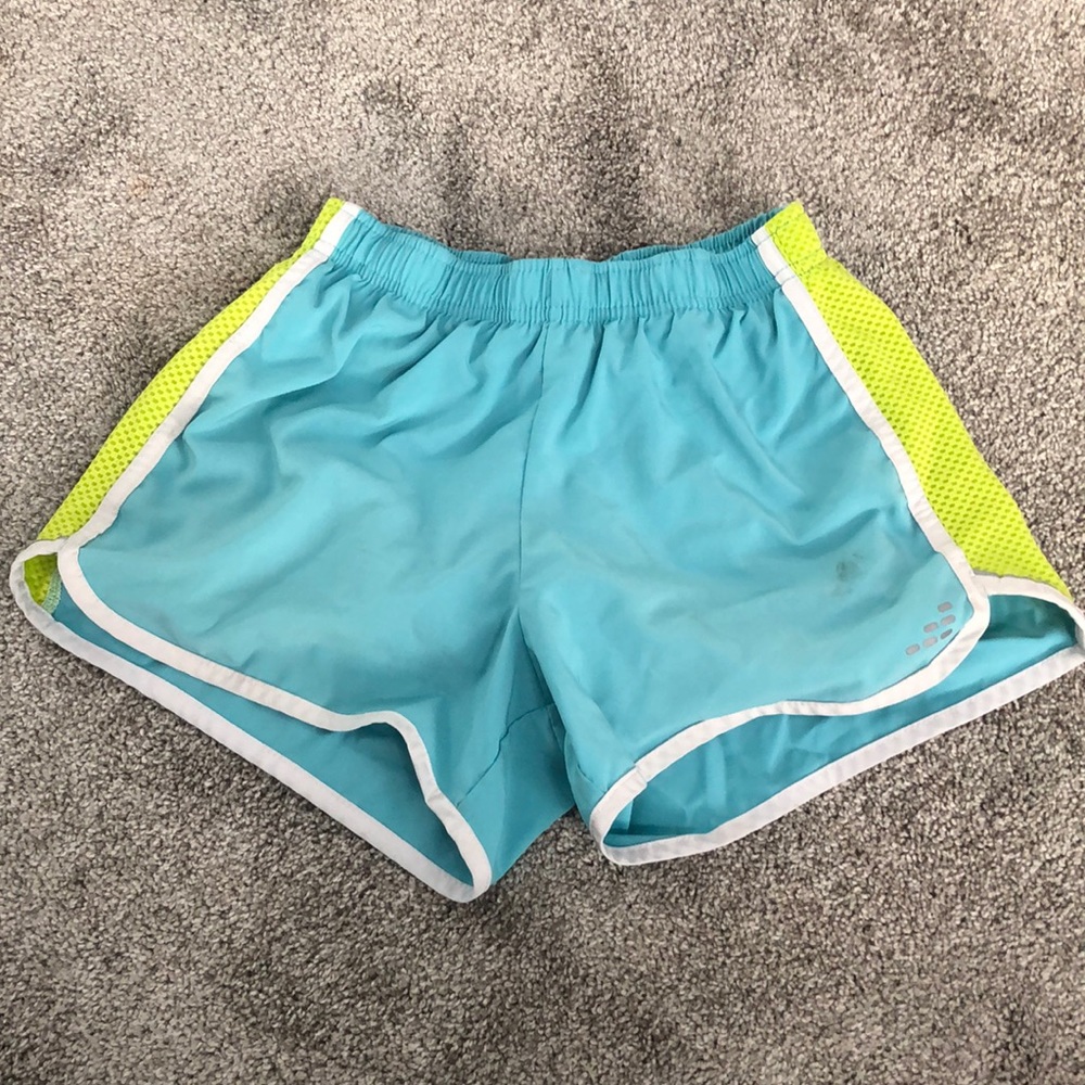 blue and green BCG women’s running shorts